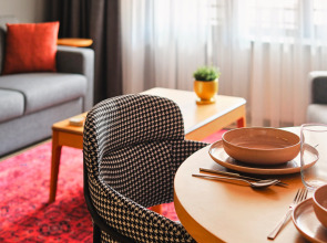 Отель TAKS-INN Suites