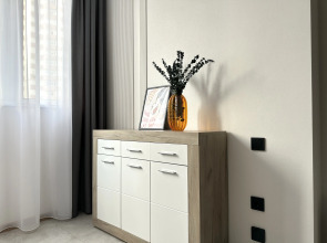 Апартаменты Уютная студия рядом с Аквапарком и Чашей