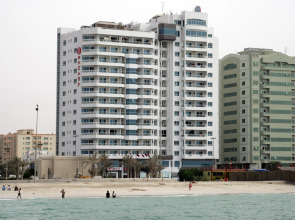 Отель Ramada By Wyndham Beach Ajman