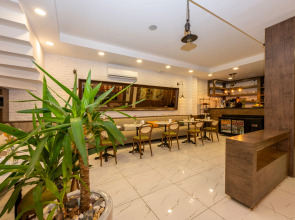 Отель The Marions Suite