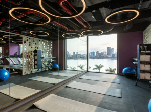 Отель Wink Danang Riverside Residence Suites - 24hrs Stay & The Best View in Town