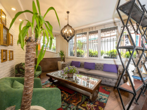 Отель The Marions Suite