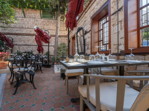 Отель Belmondo Suites