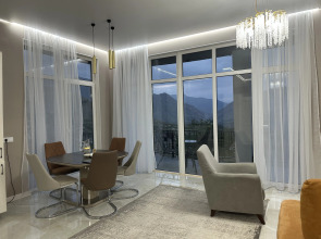 Апартаменты Панорамный дом среди вершин