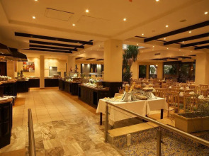 Курортный Отель Swiss Inn Pyramids Golf Resort