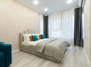 Апартаменты с панорамными окнами на набережной реки