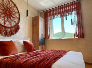 Апартаменты в стиле бохо с видом на море и горы