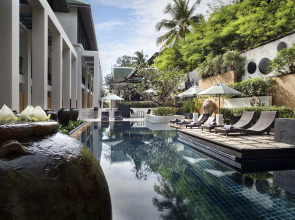 Отель OUTRIGGER Surin Beach Resort