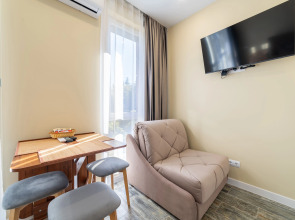 Квартира Дизайнерская студия на закрытой территории рядом с бассейном