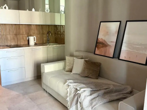 Апартаменты Unique Apart Рубин рядом с Ледовой ареной Груздева, КРИРПО и ТЦ Гринвич на Молодежном 19б