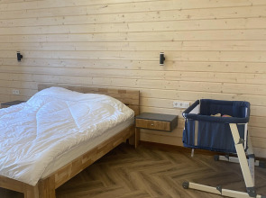 Частный дом Традиция отдыха - дом у озера c баней и купелью