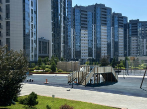 Апартаменты Уютная студия рядом с Аквапарком и Чашей