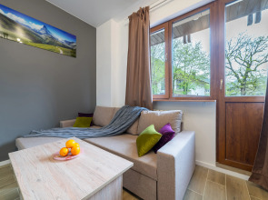 Апартаменты Просторная студия с балконом и видом на горы