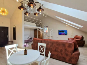 Квартира Просторная двухуровневая студия у подножия Казанского Кремля