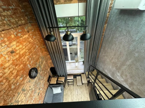 Апартаменты Двухуровневая студия с двумя санузлами в парке