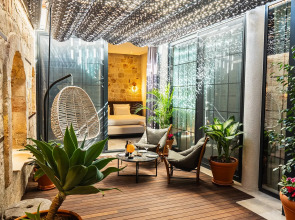 Отель Belmondo Suites