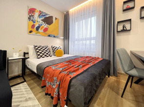 Апартаменты Granada Красивая студия в новом апарт-отеле на берегу канала