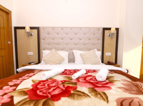 Отель Ganesha Inn