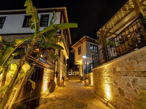 Отель WOO Town Suites