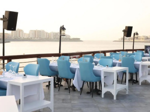 Отель Dubai Marine Beach Resort & Spa