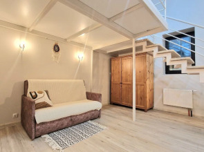 Квартира Просторная двухуровневая студия у подножия Казанского Кремля