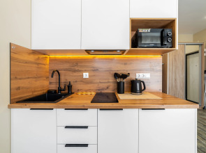 Квартира Дизайнерская студия на закрытой территории рядом с бассейном