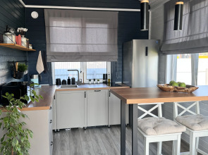 Частный дом Уютный дом в стиле барнхаус, с сауной, недалеко от реки