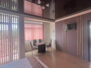 Апартаменты Островок Делюкс