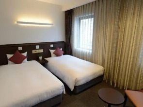 Отель Natural Hot Spring Midosuji Hotel