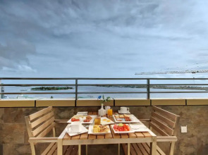 Отель Unima Grand