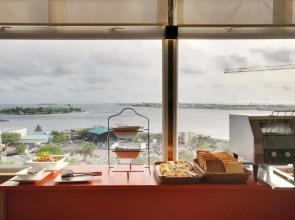 Отель Unima Grand