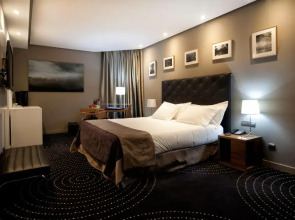 Отель Silken Amara Plaza