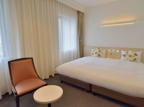 Отель Natural Hot Spring Midosuji Hotel