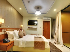 Отель Unima Grand