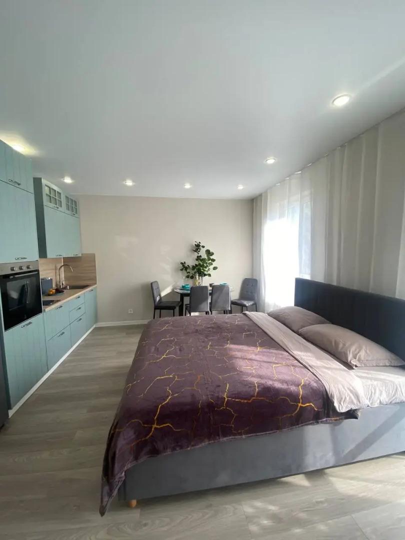 Квартира Уютная студия для семьи или пары