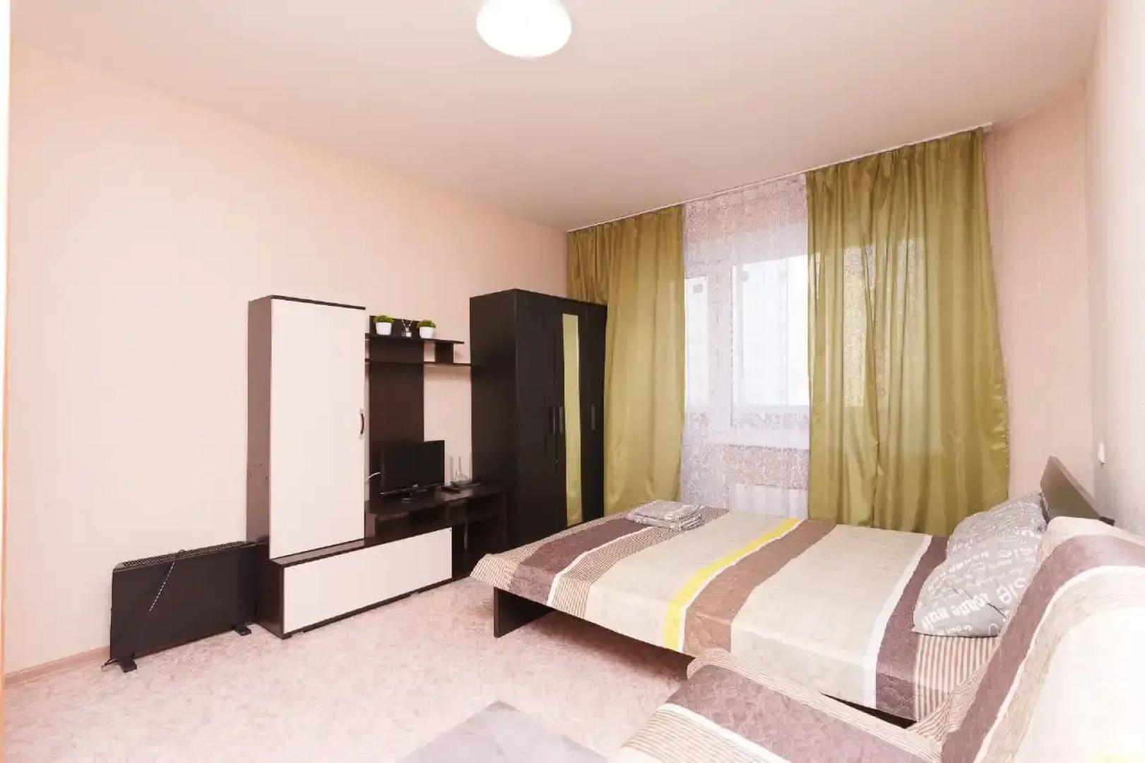 Апартаменты Уютная студия Матрешкин двор