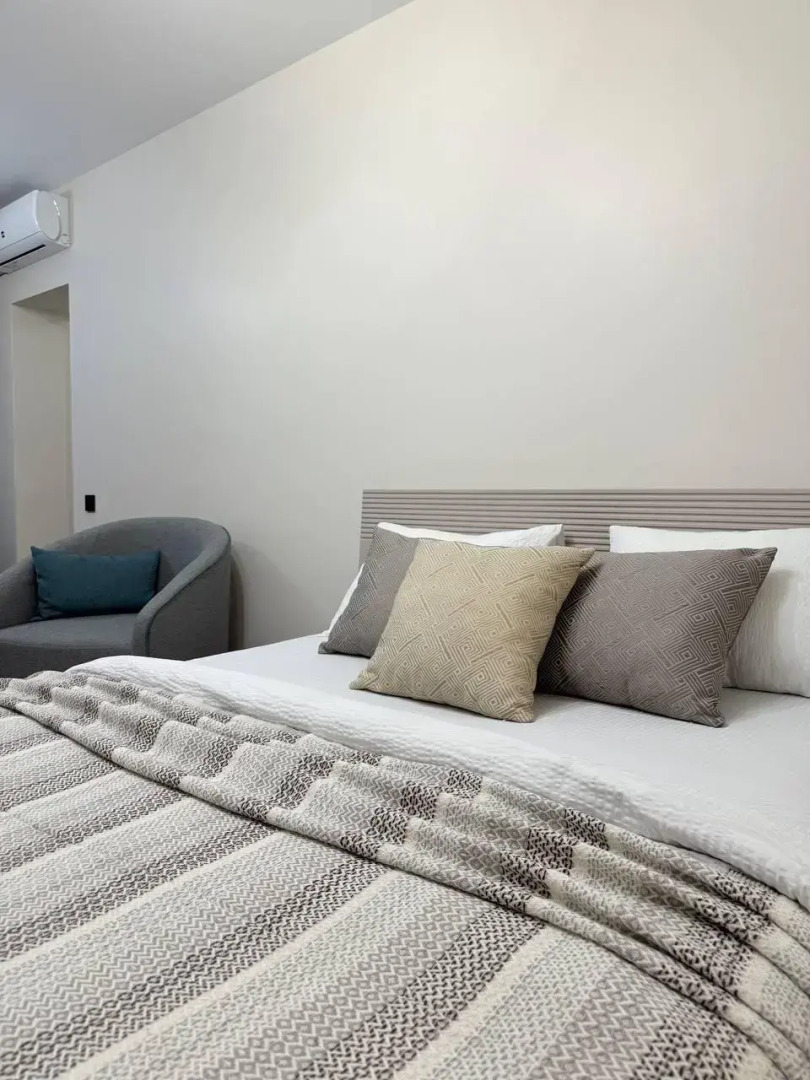 Современная студия в центре Апартаменты