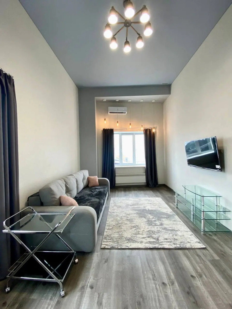 Квартира Просторная студия в центральной части города